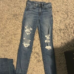 American Eagle next level stretch distressed skinny jeans. Good condition